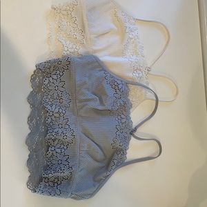 Two lace bralettes.
